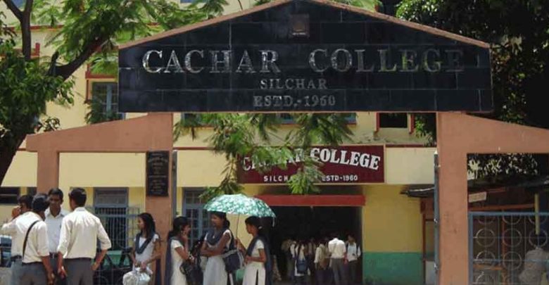 Teachers and non-teaching staff at Cachar College stage sit in demonstration